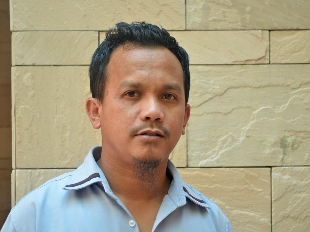 Kaharudin Alim, one of the cleaning staff at CMU-QPhoto by Silma Suba