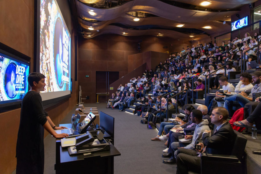 Mia Tramz speaking at a community meeting at Northwestern University in Qatar. Photo provided by NU-Q.