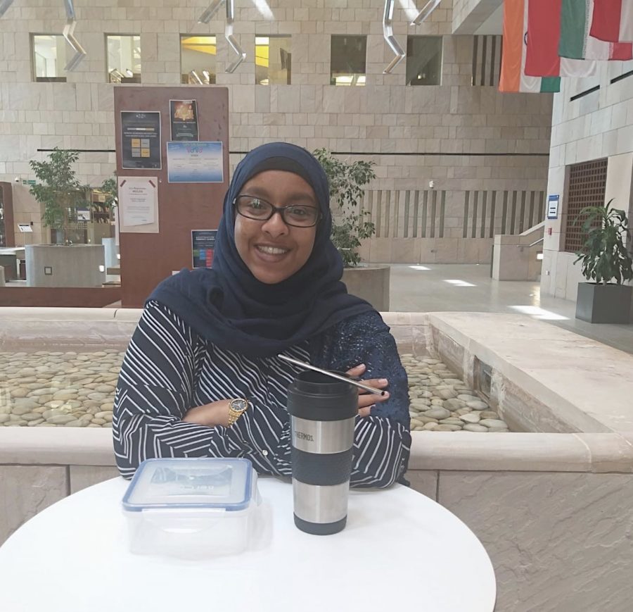 Iman Ismail with the reusable products she uses daily. Photo by Natasha Das.
